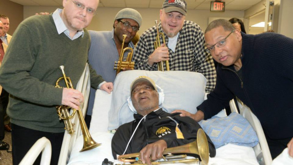 JLCO with Wynton Marsalis and Cécile McLorin visiting Clark Terry in the hospital